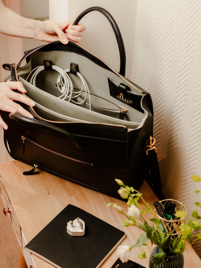 Why a Bag with a Built-In Charger Holder is a Must-Have